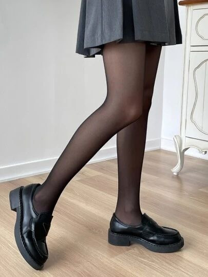 جوراب شلواری مجلسی شیشه ای بدن نما مشکی